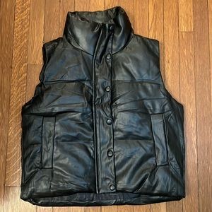 Black faux leather puffer vest size small.